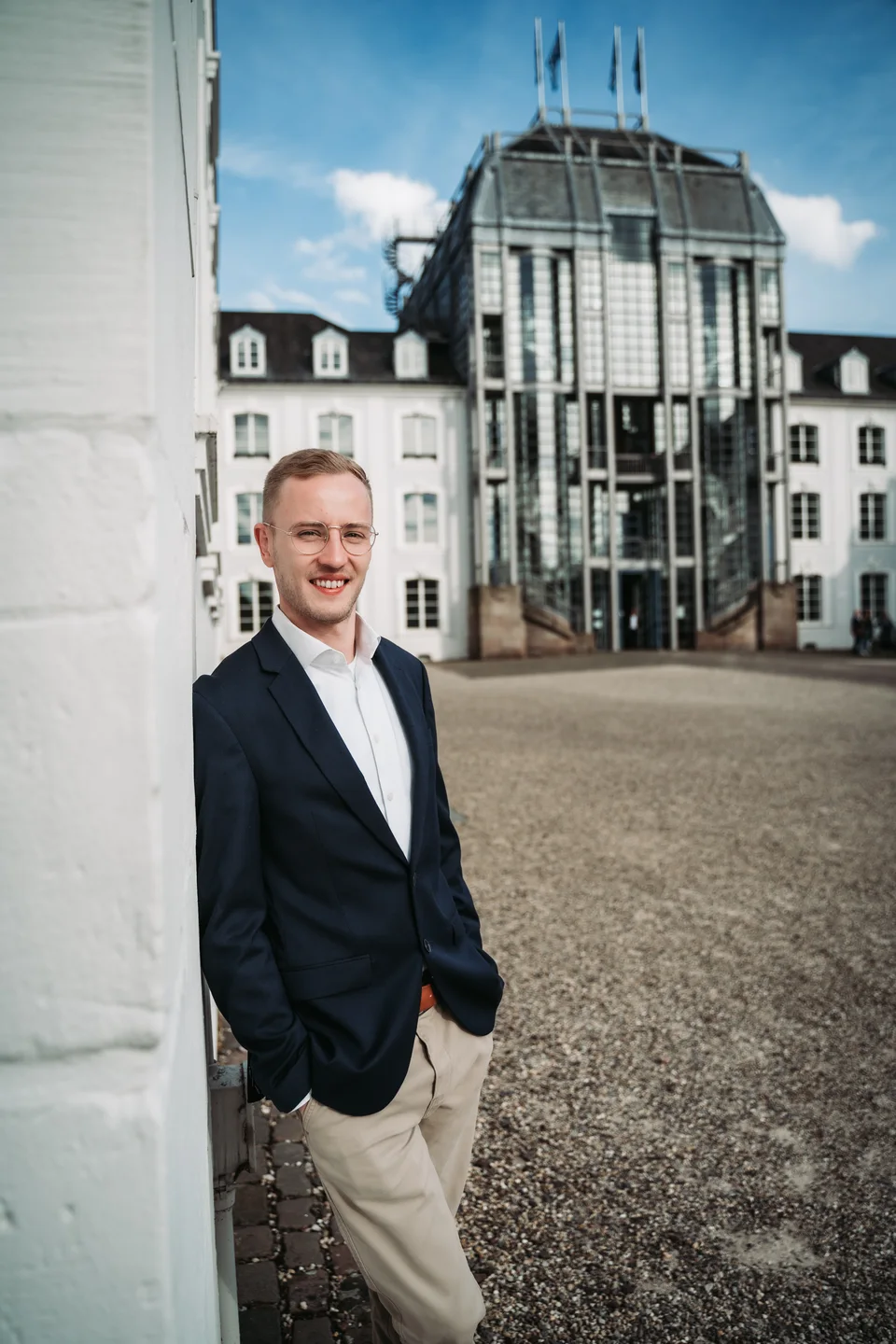 Jannik Trenz outdoors in front of a building